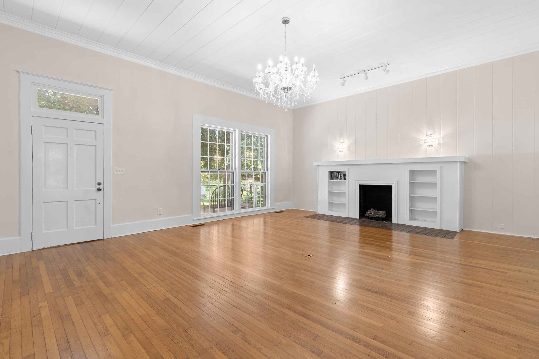219 Old Mill Road Winchester, TN 37398 - Photo 8 of 23 a view of empty room with wooden floor and fireplace
