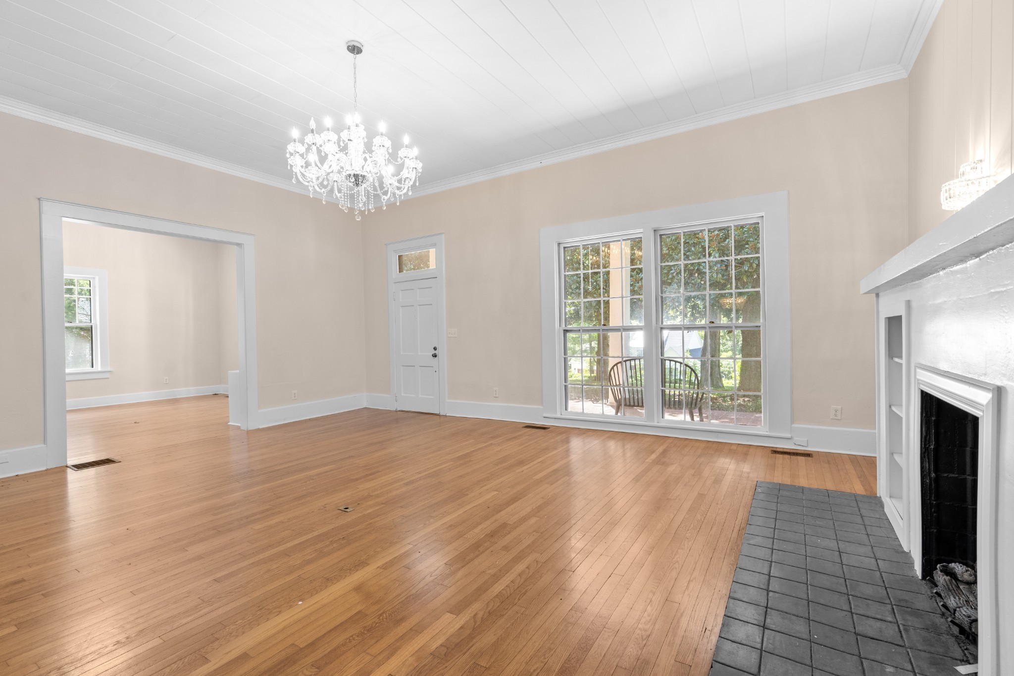 219 Old Mill Road Winchester, TN 37398 - Photo 9 of 23 a view of an empty room with wooden floor and a window