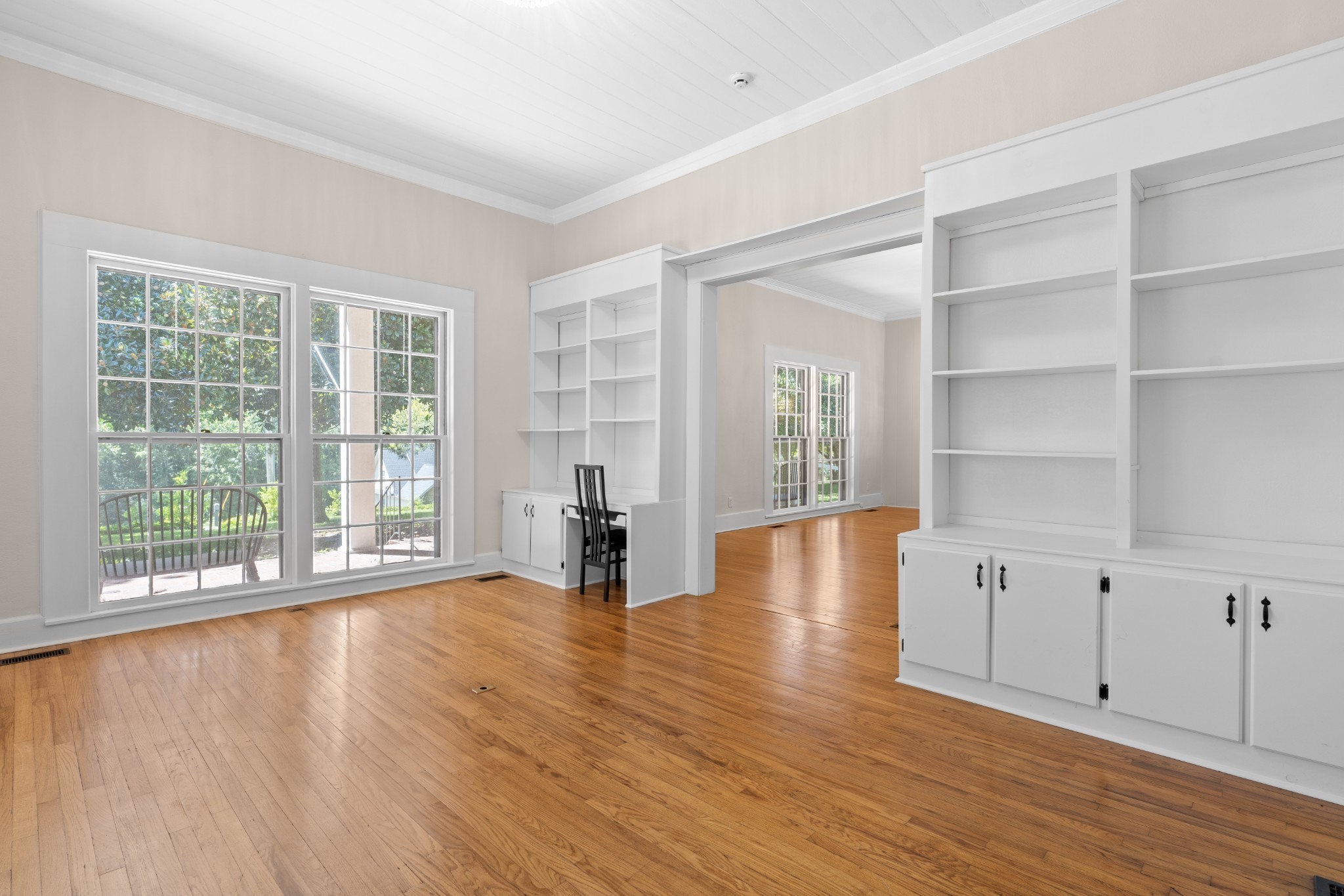 219 Old Mill Road Winchester, TN 37398 - Photo 10 of 23 a view of an empty room with wooden floor and a window
