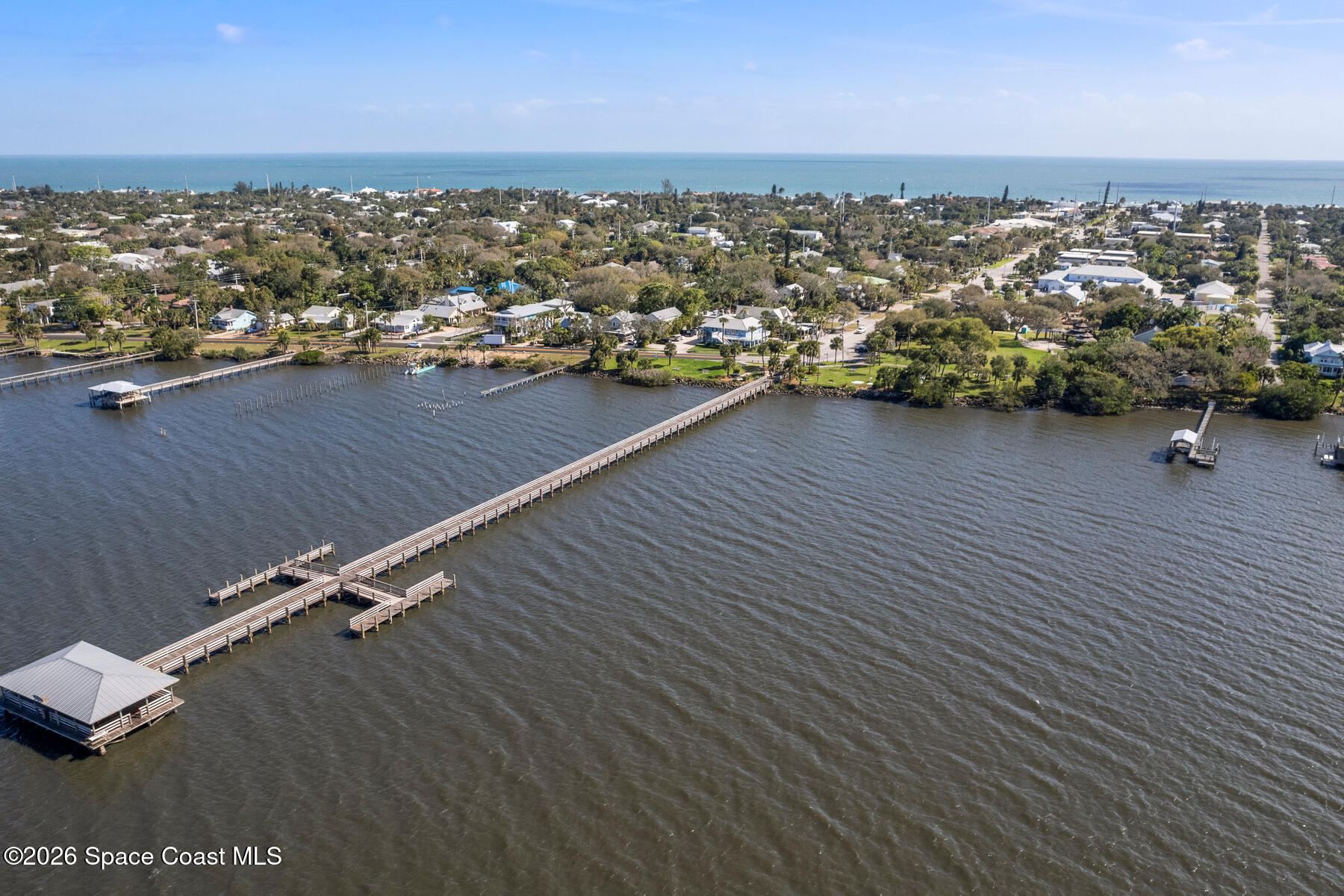 212 Surf Road Melbourne Beach, FL 32951 - Photo 12 of 14 an aerial view of residential houses with outdoor space