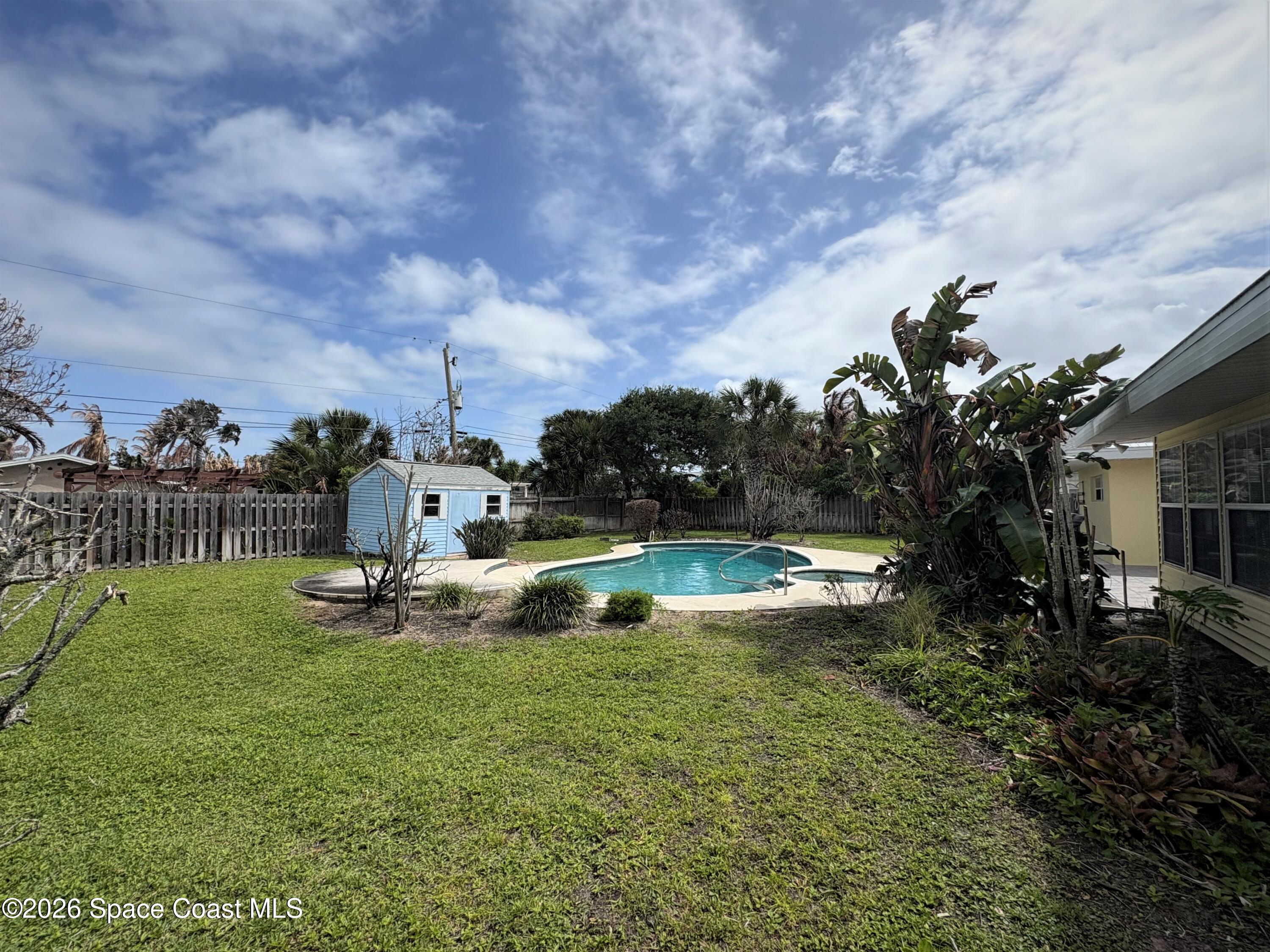 212 Surf Road Melbourne Beach, FL 32951 - Photo 8 of 14 a view of a lake with houses