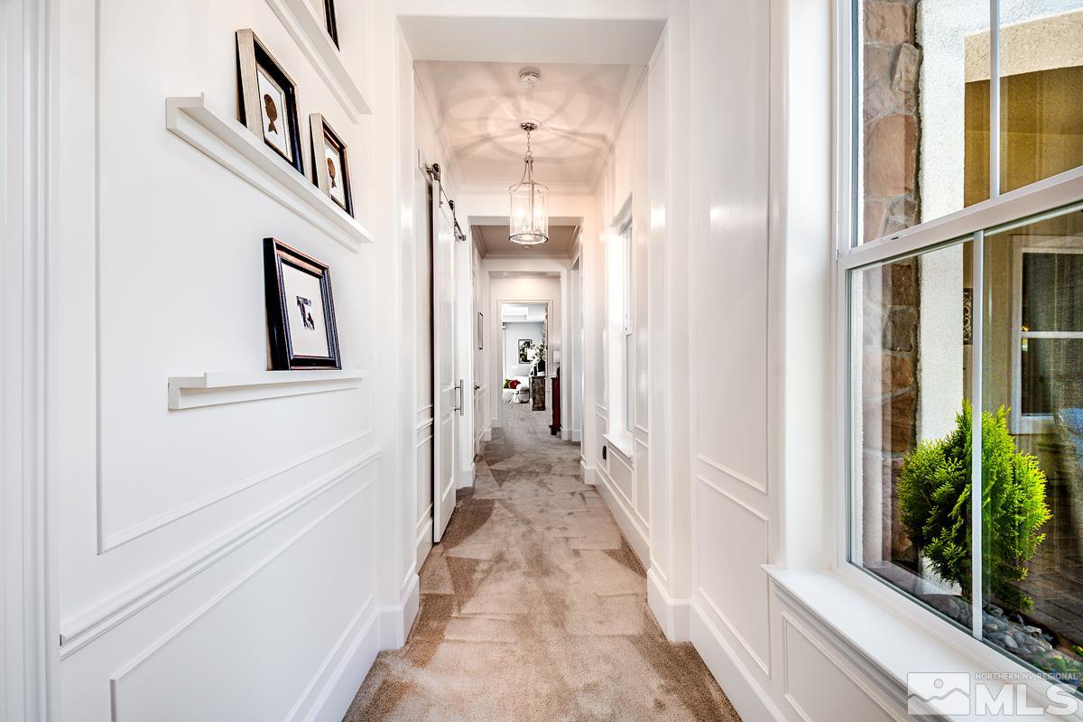 2906 Miramis Court Reno, NV 89521 - Photo 15 of 25 a view of a hallway with a flower pot