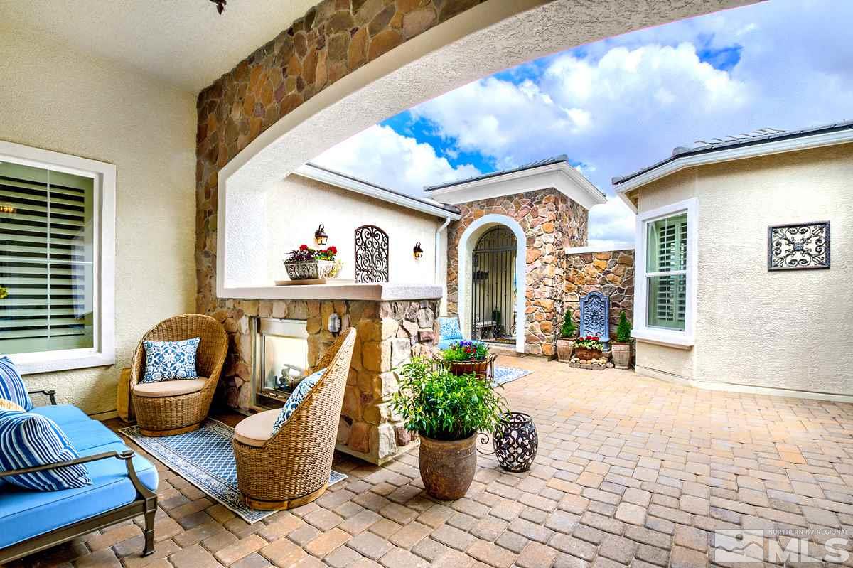 2906 Miramis Court Reno, NV 89521 - Photo 3 of 25 a front view of a house with outdoor seating