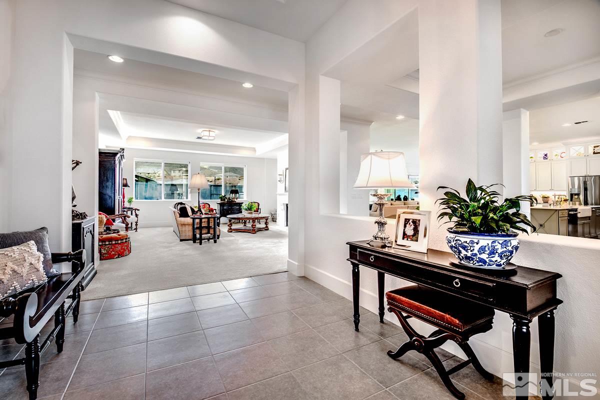 2906 Miramis Court Reno, NV 89521 - Photo 4 of 25 a lobby with furniture and a potted plant