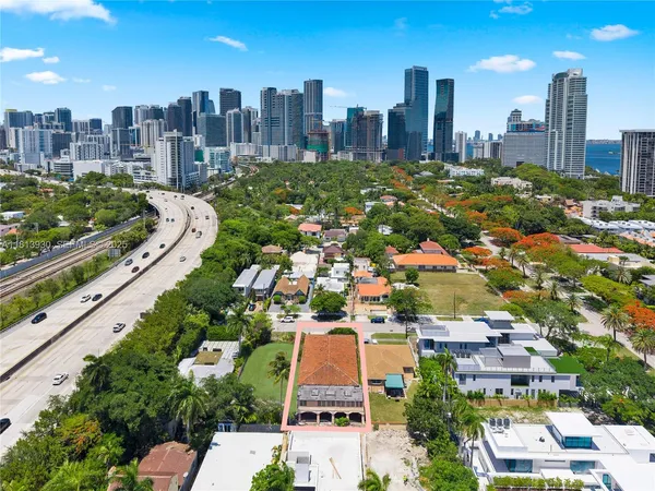 a view of a city with tall buildings