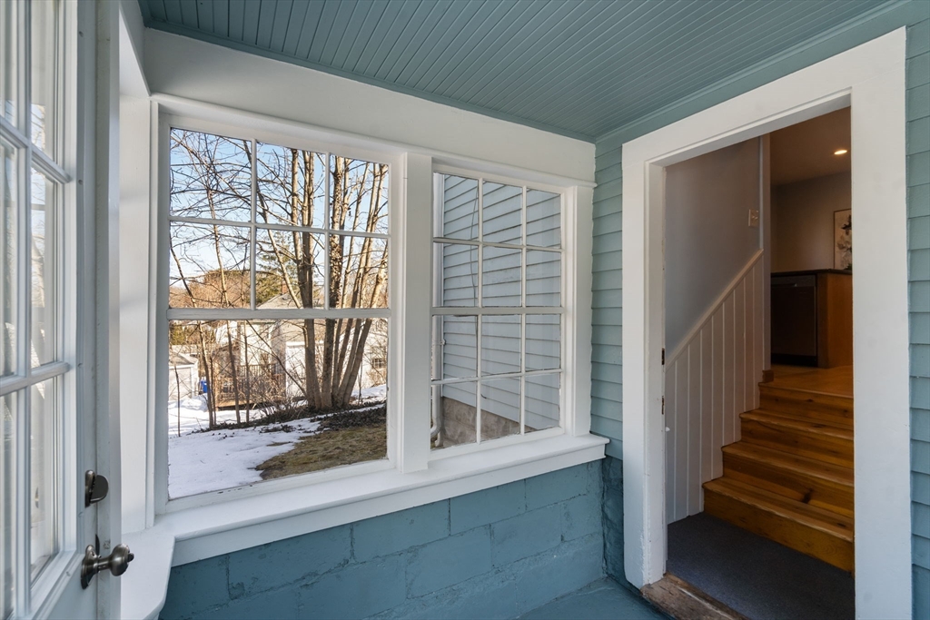 38 Fairfield Street Maynard, MA 01754 - Photo 17 of 42 a view of wooden floor and windows in a room
