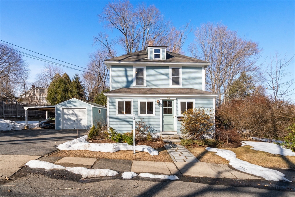 38 Fairfield Street Maynard, MA 01754 - Photo 30 of 42 a front view of a house with a yard