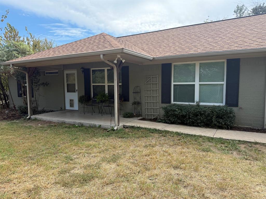 2001 Wood Trail Azle, TX 76020 - Photo 1 of 30 a view of a house with a porch