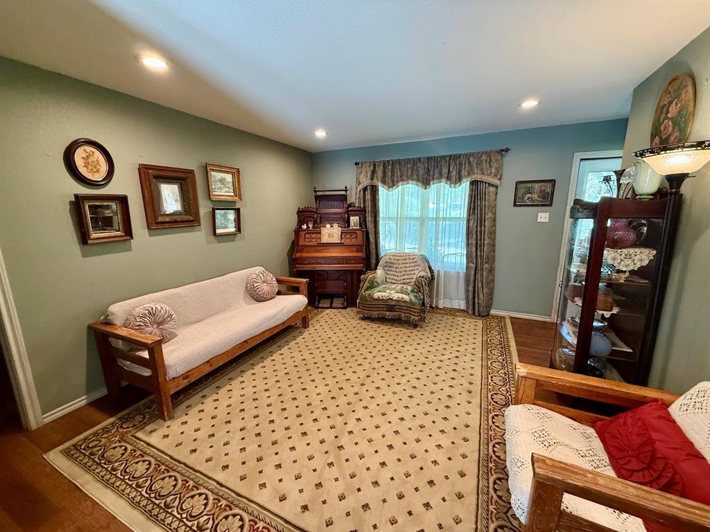 2001 Wood Trail Azle, TX 76020 - Photo 11 of 30 a bedroom with furniture and a window