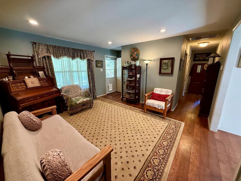 2001 Wood Trail Azle, TX 76020 - Photo 12 of 30 a bedroom with furniture and a window