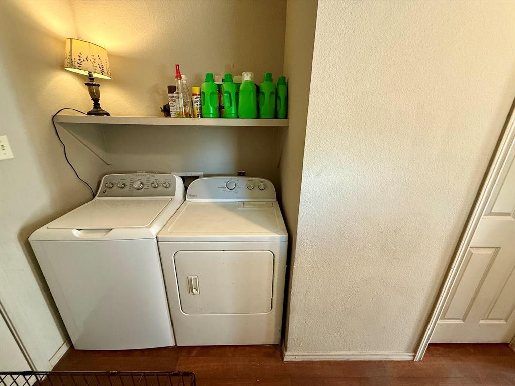 2001 Wood Trail Azle, TX 76020 - Photo 25 of 30 a utility room with dryer and washer