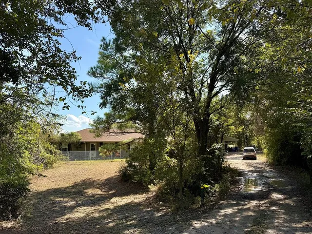 a view of outdoor space and yard