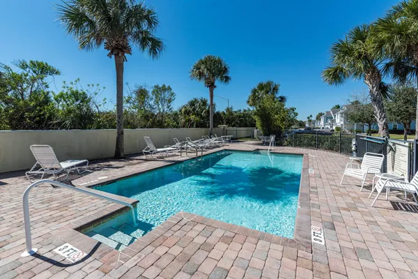 a view of a backyard with a patio