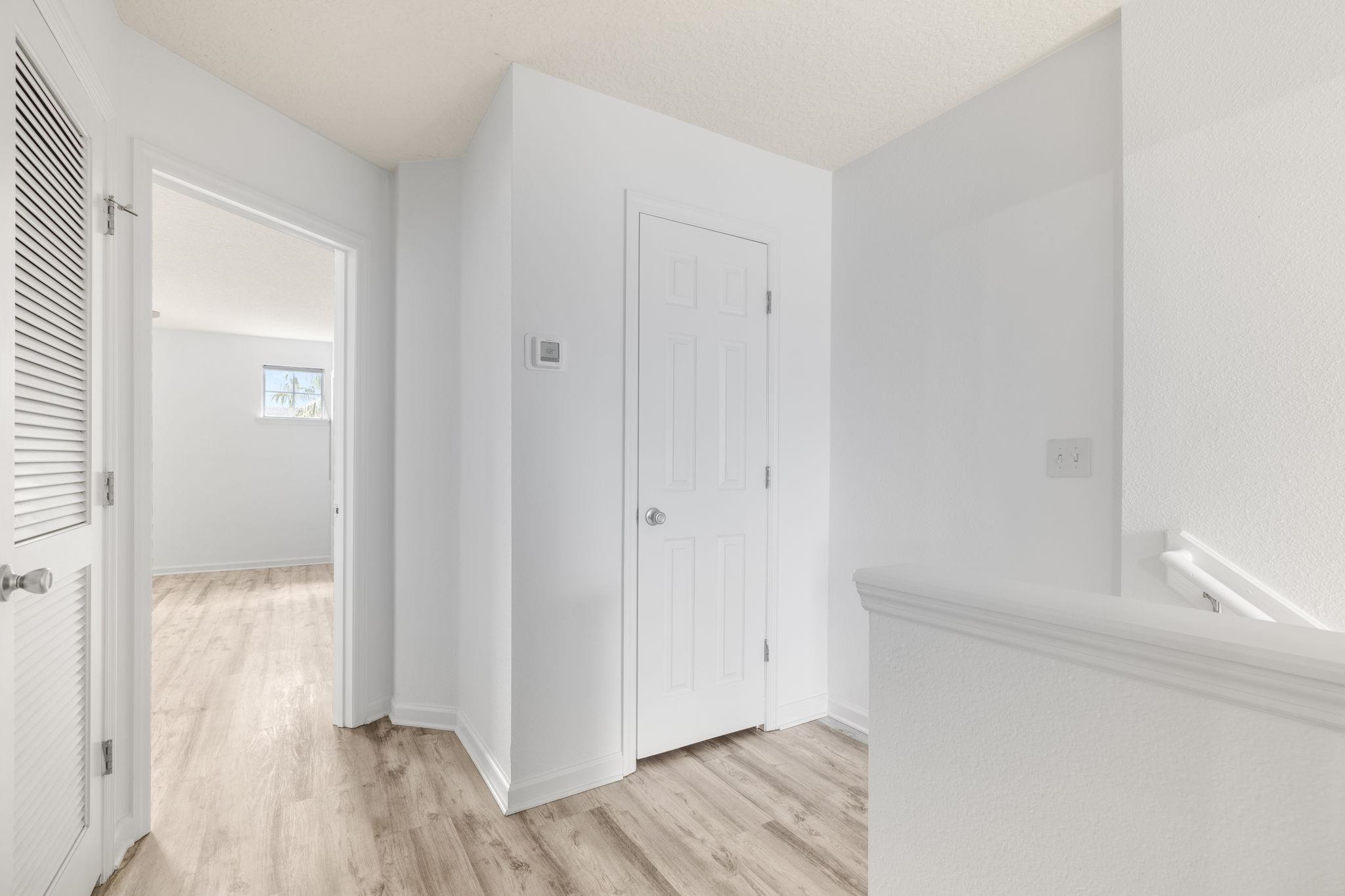 128 Islander Circle St. Augustine, FL 32080 - Photo 10 of 24 a view of hallway with wooden floor