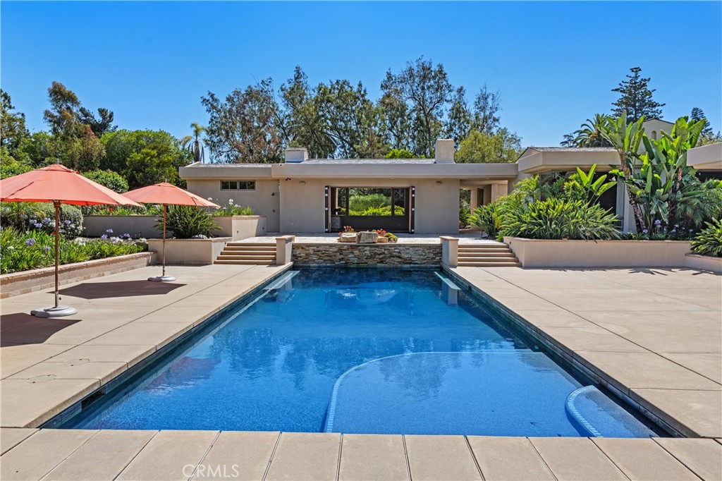 6533 Lago Lindo Rancho Santa Fe, CA 92067 - Photo 45 of 57 a view of a backyard with a patio