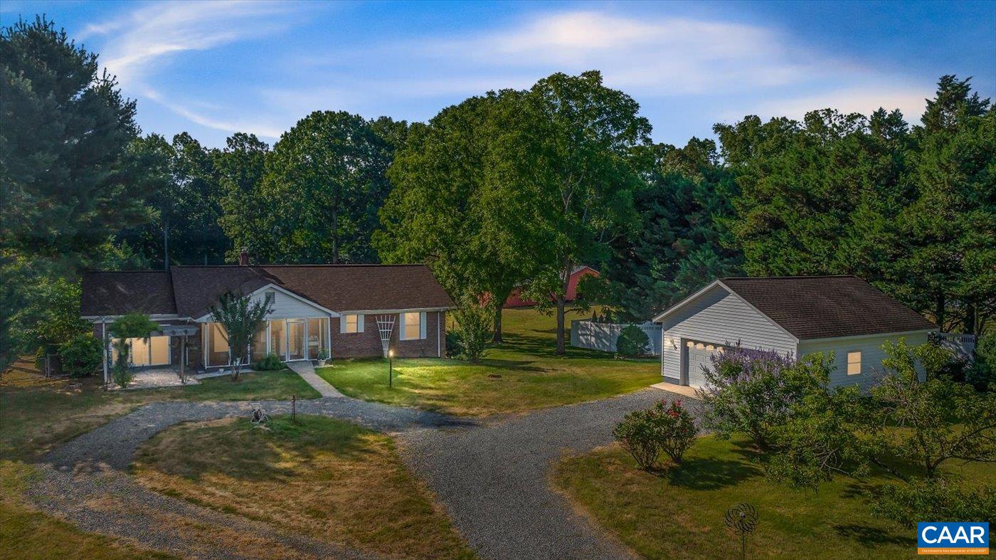 6134 Spring Hill Road Ruckersville, VA 22968 - Photo 1 of 54 a house view with a garden space