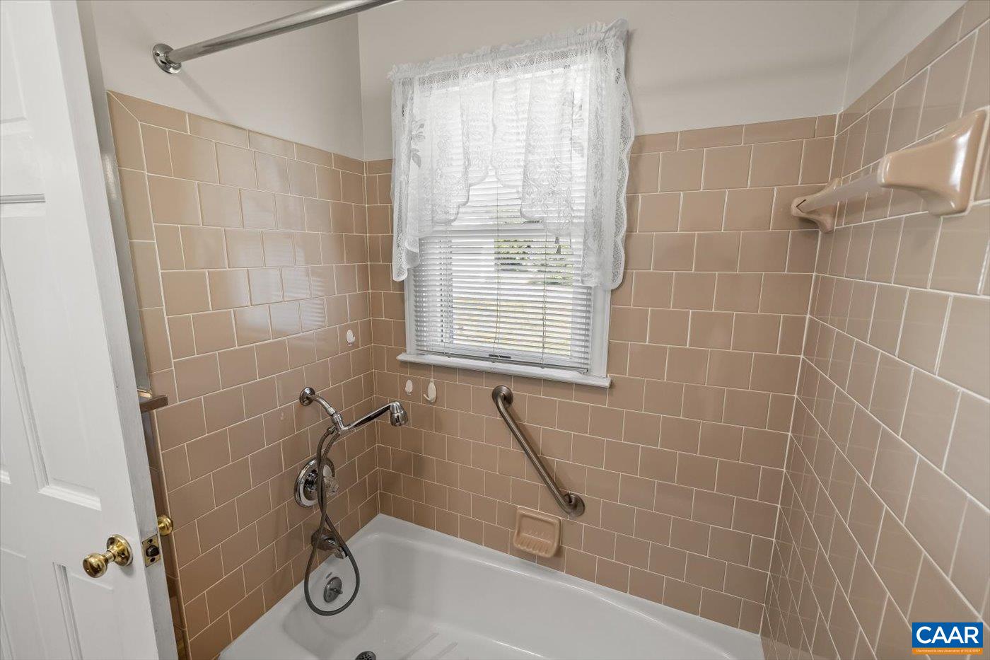 6134 Spring Hill Road Ruckersville, VA 22968 - Photo 39 of 54 a bathroom with a shower and a window