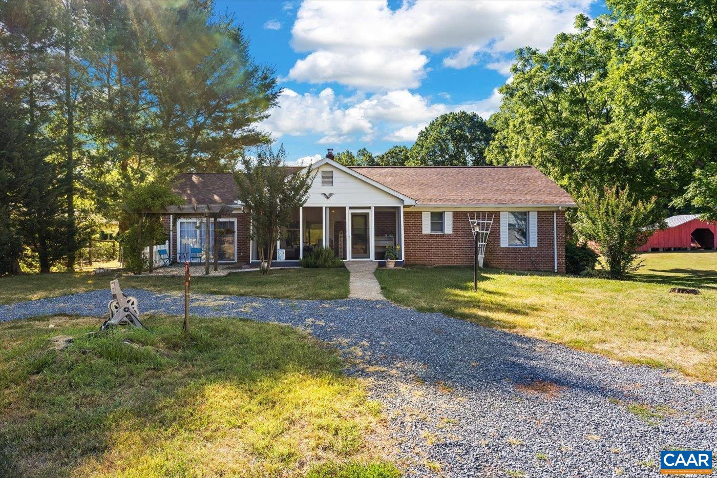 6134 Spring Hill Road Ruckersville, VA 22968 - Photo 4 of 54 a view of house that has a bunch of plants and trees in the background