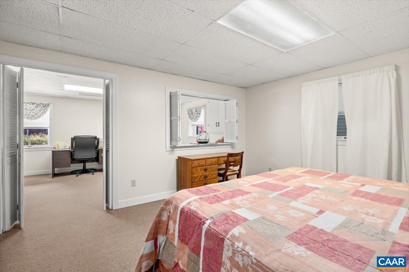 6134 Spring Hill Road Ruckersville, VA 22968 - Photo 45 of 54 a bedroom with a bed and a cabinets
