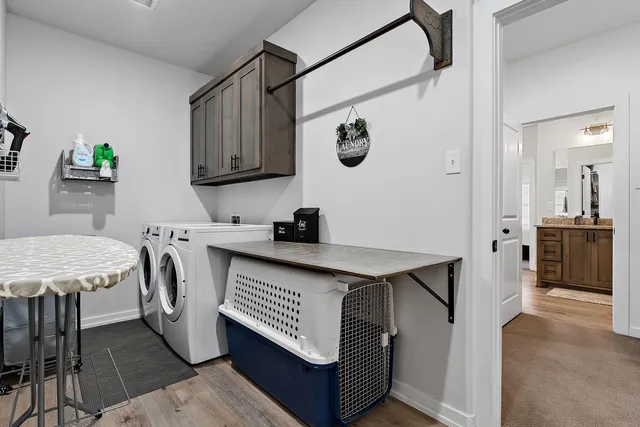 a bedroom with furniture and a ceiling fan