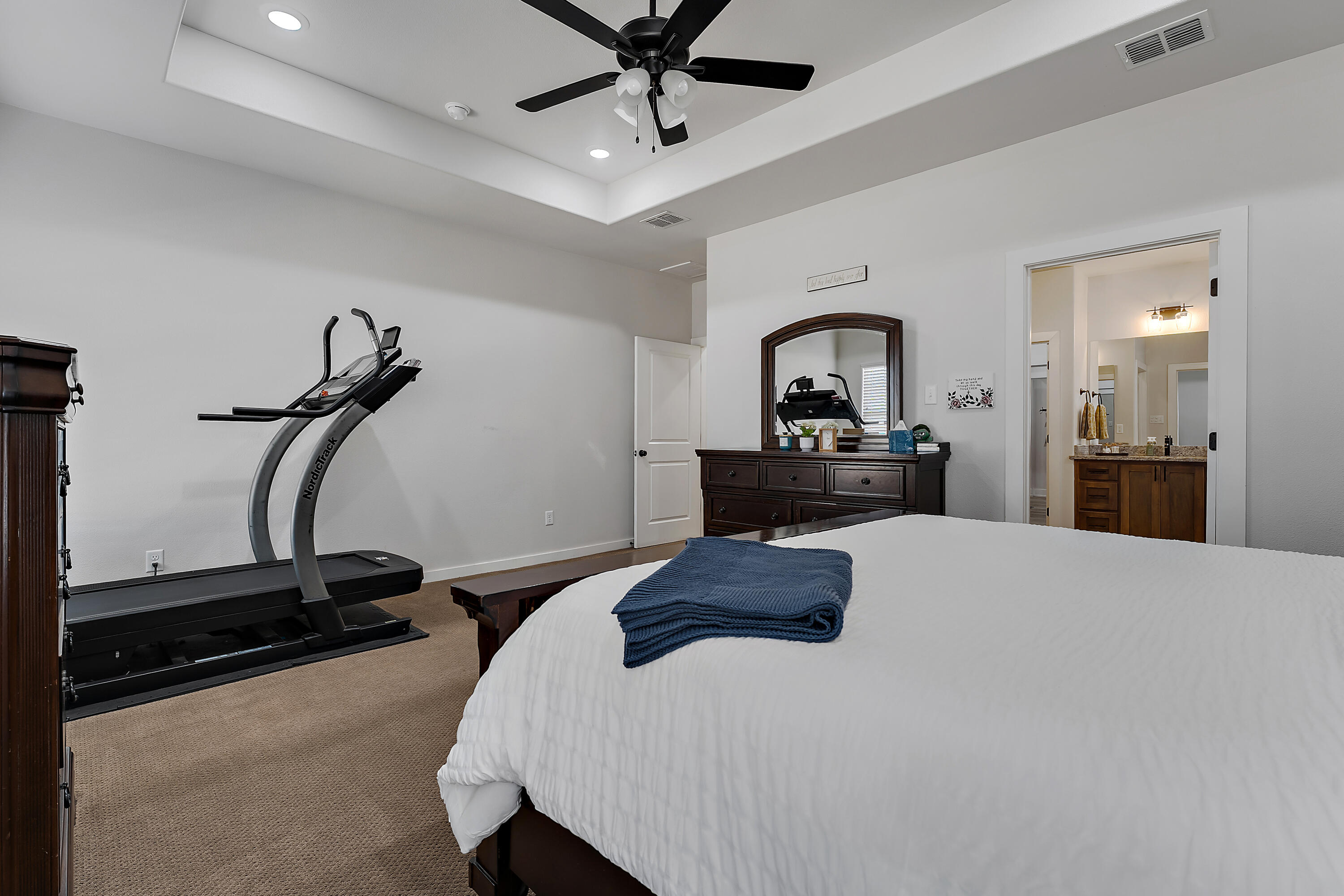 9218 County Road 6870 Lubbock, TX 79407 - Photo 22 of 45 a bedroom with a bed and dresser