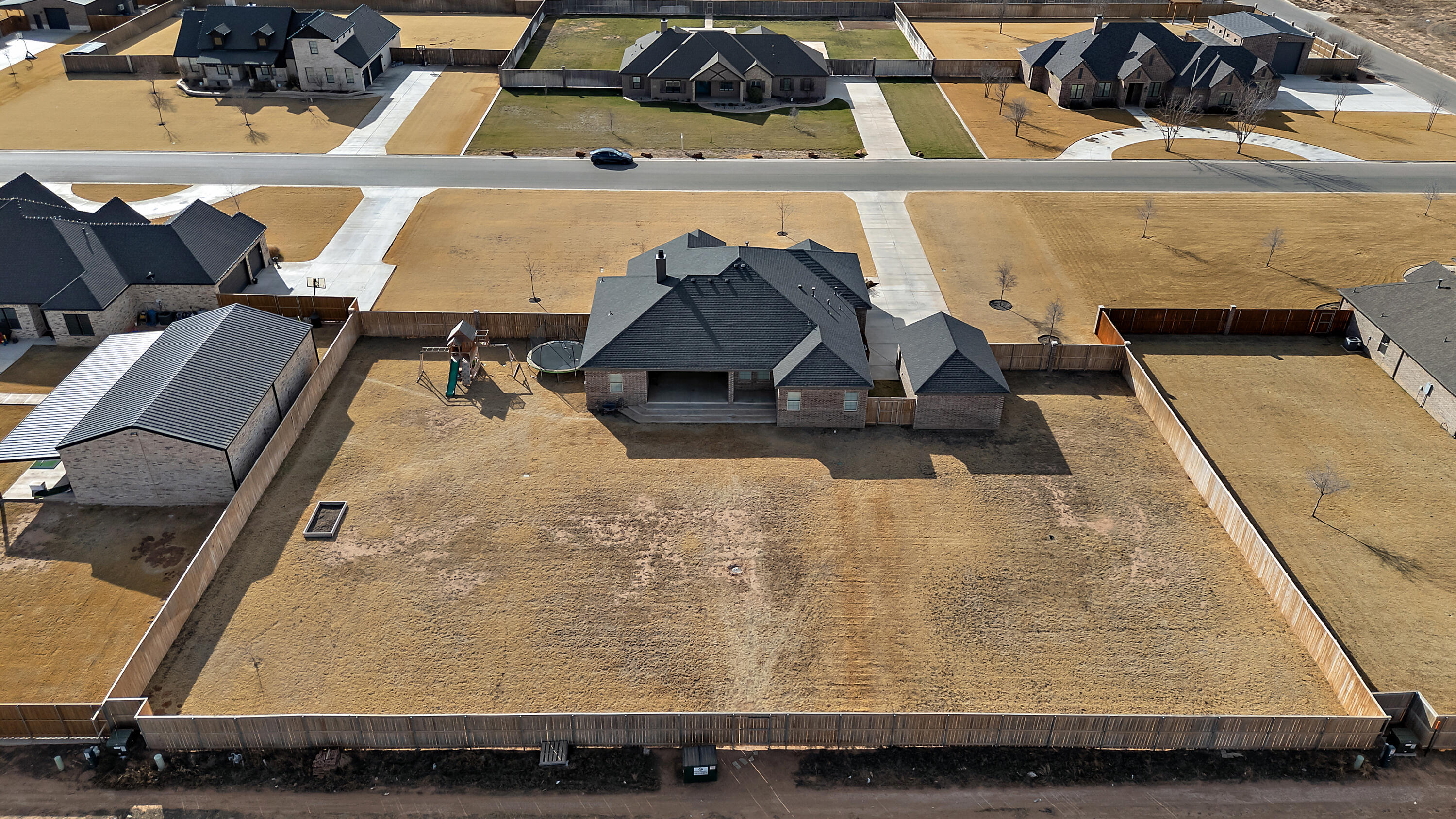 9218 County Road 6870 Lubbock, TX 79407 - Photo 40 of 45 wooden floor with view of living room