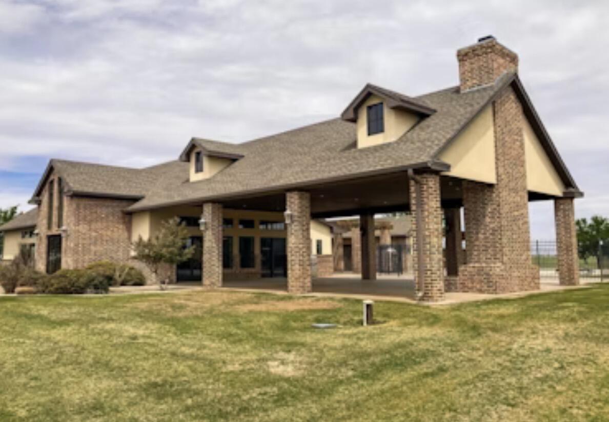 9218 County Road 6870 Lubbock, TX 79407 - Photo 43 of 45 a front view of a house with a yard