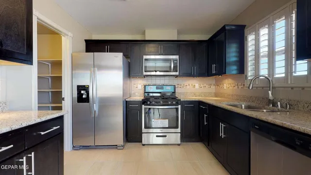 a room with cabinets and a wooden floor