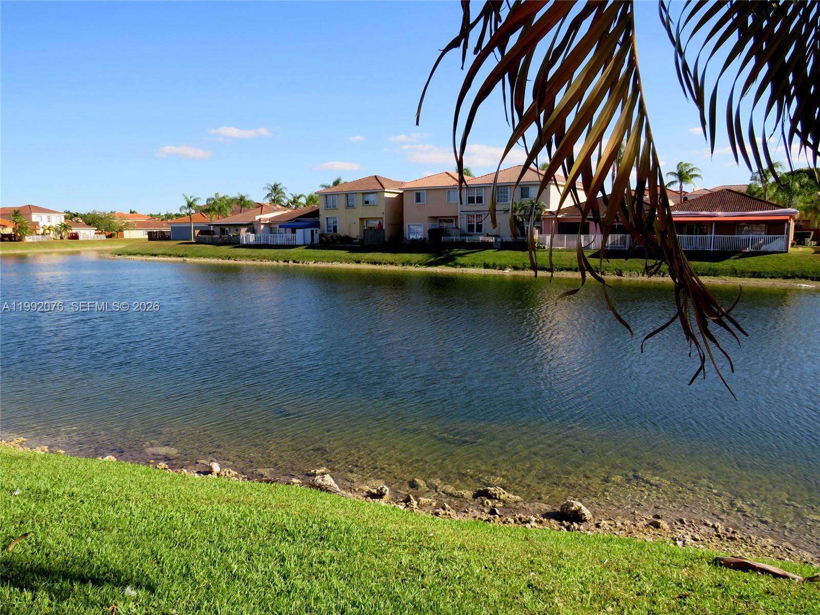 16330 Southwest 102nd Street Miami, FL 33196 - Photo 16 of 30 an aerial view of a houses with yard