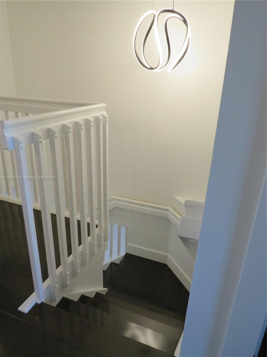 16330 Southwest 102nd Street Miami, FL 33196 - Photo 19 of 30 a view of entryway with wooden floor
