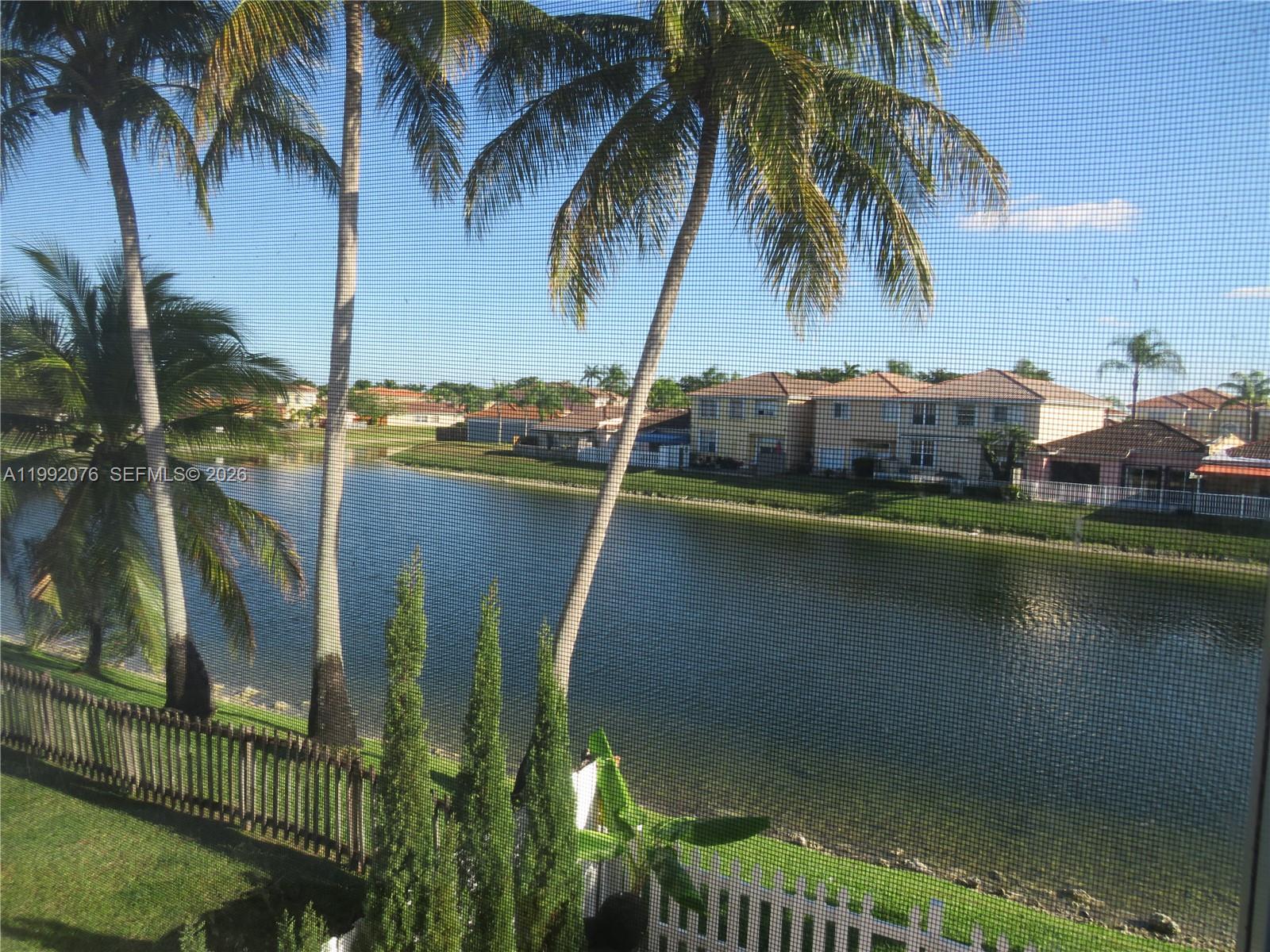 16330 Southwest 102nd Street Miami, FL 33196 - Photo 29 of 30 a view of a lake