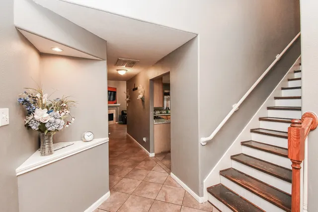 a room with furniture and wooden floor
