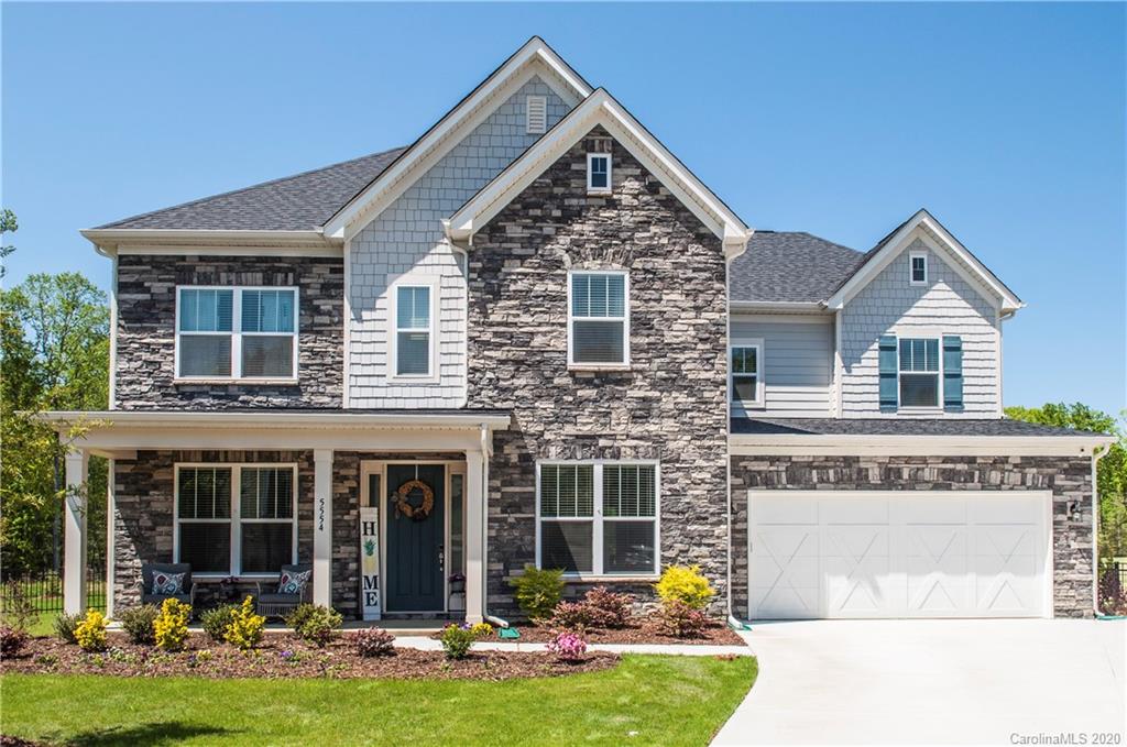 5554 Braddock Ml Way Lancaster, SC 29720 - Photo 1 of 33 a front view of a house with garden
