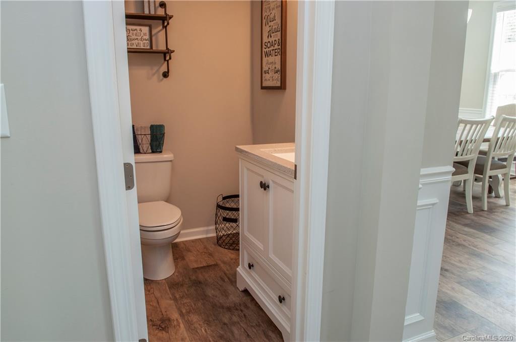 5554 Braddock Ml Way Lancaster, SC 29720 - Photo 11 of 33 a bathroom with a toilet sink and vanity