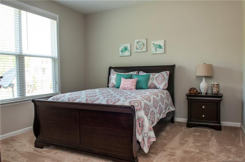 5554 Braddock Ml Way Lancaster, SC 29720 - Photo 12 of 33 a bedroom with a bed and a window