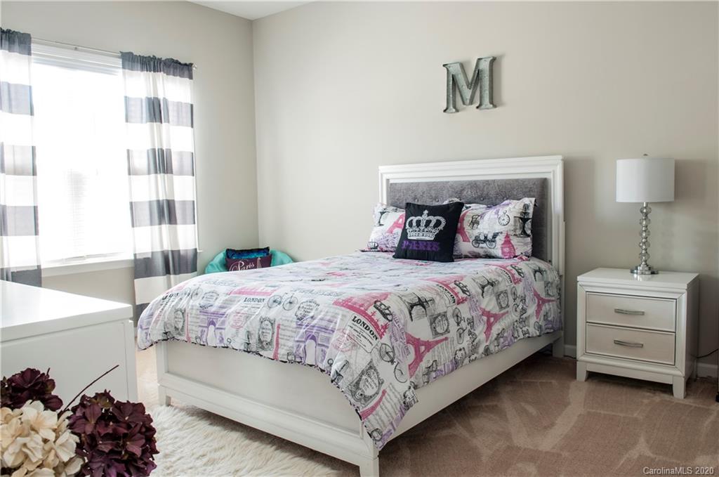 5554 Braddock Ml Way Lancaster, SC 29720 - Photo 17 of 33 a bedroom with a bed and a window