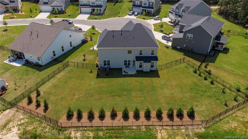 5554 Braddock Ml Way Lancaster, SC 29720 - Photo 24 of 33 a aerial view of a house with swimming pool and large trees