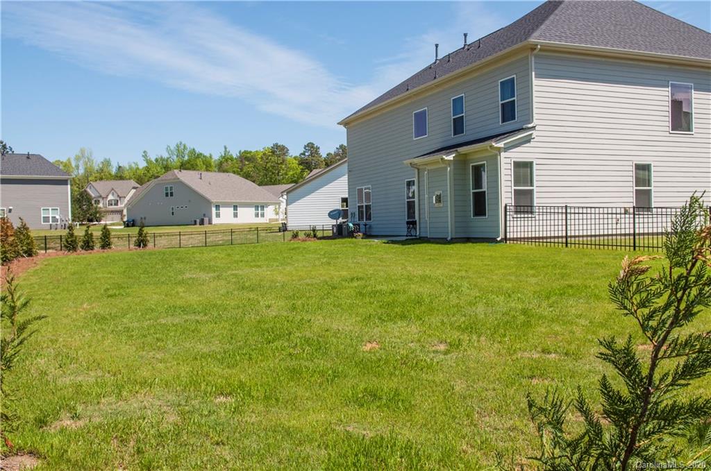 5554 Braddock Ml Way Lancaster, SC 29720 - Photo 26 of 33 a view of a house with a yard