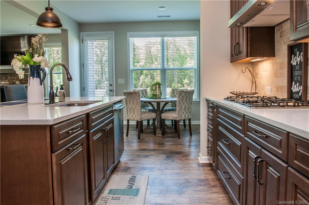 5554 Braddock Ml Way Lancaster, SC 29720 - Photo 5 of 33 a kitchen with stainless steel appliances a sink and a stove