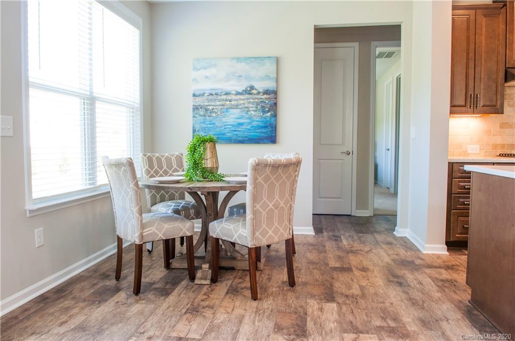 5554 Braddock Ml Way Lancaster, SC 29720 - Photo 6 of 33 a dining room with furniture and window