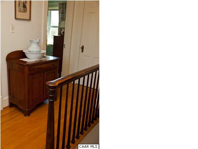 425 Madison Road Stanardsville, VA 22973 - Photo 13 of 23 a view of a hallway with mirror