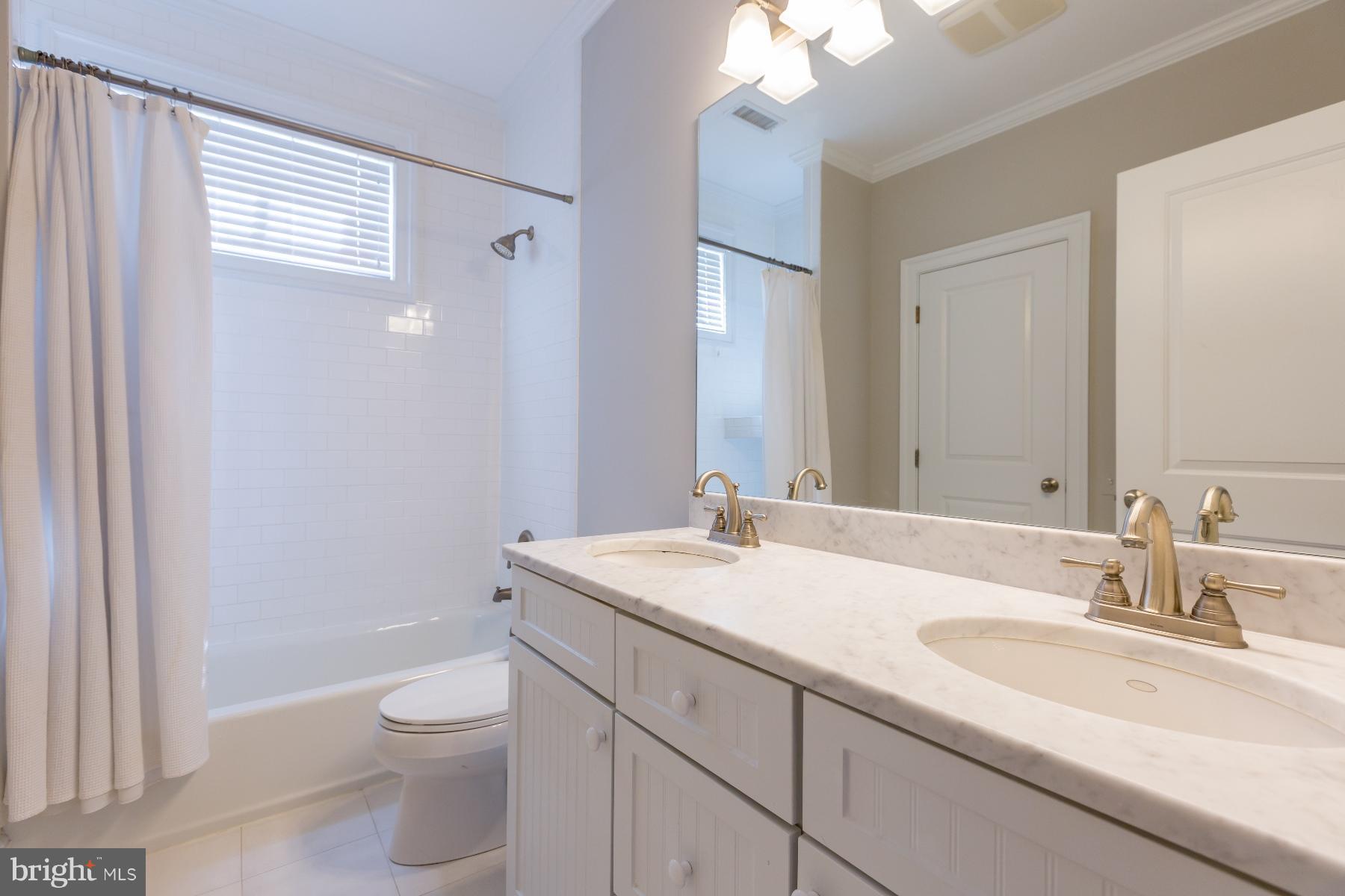 4613 Sleaford Road Bethesda, MD 20814 - Photo 15 of 29 Hall Bath with en-suite to BR #3 on second floor