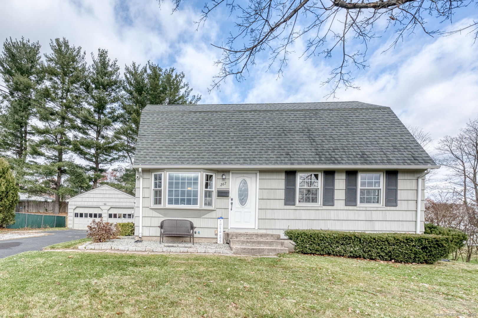 front view of a house with a yard