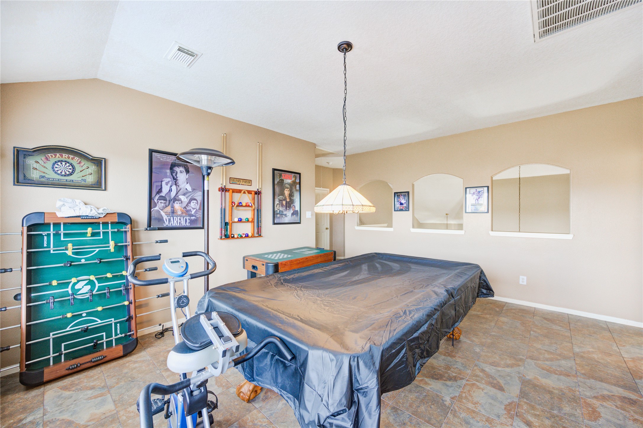 16730 Spring Barker Drive Cypress, TX 77429 - Photo 4 of 50 a room with furniture and paintings on the wall