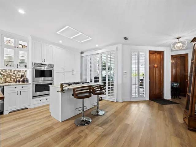a bathroom with a sink and a stove