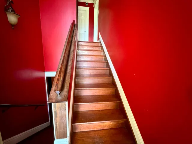 a dining room with furniture and windows