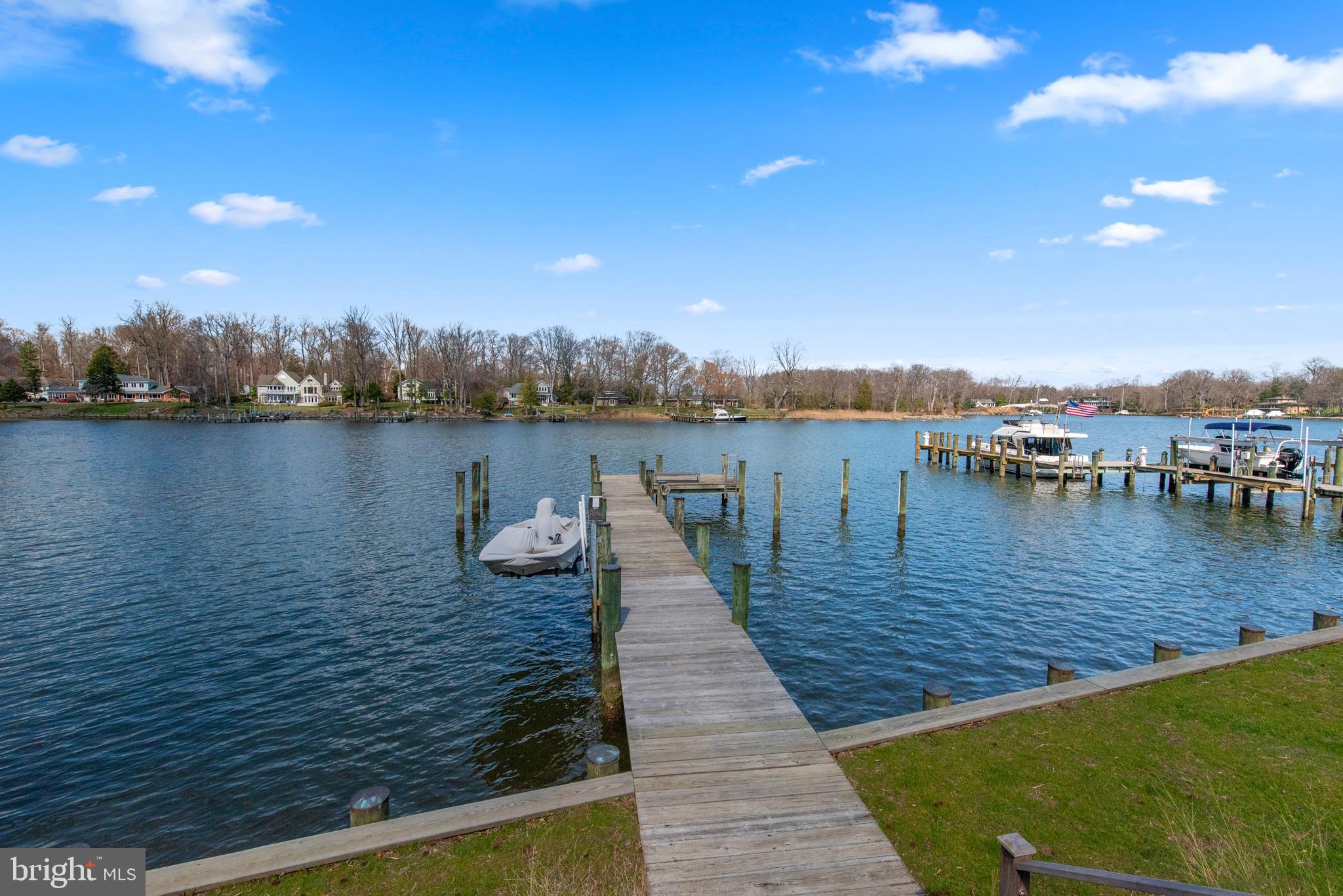 708 Black Forest Road Annapolis, MD 21409 - Photo 72 of 82 a view of a lake with sitting area