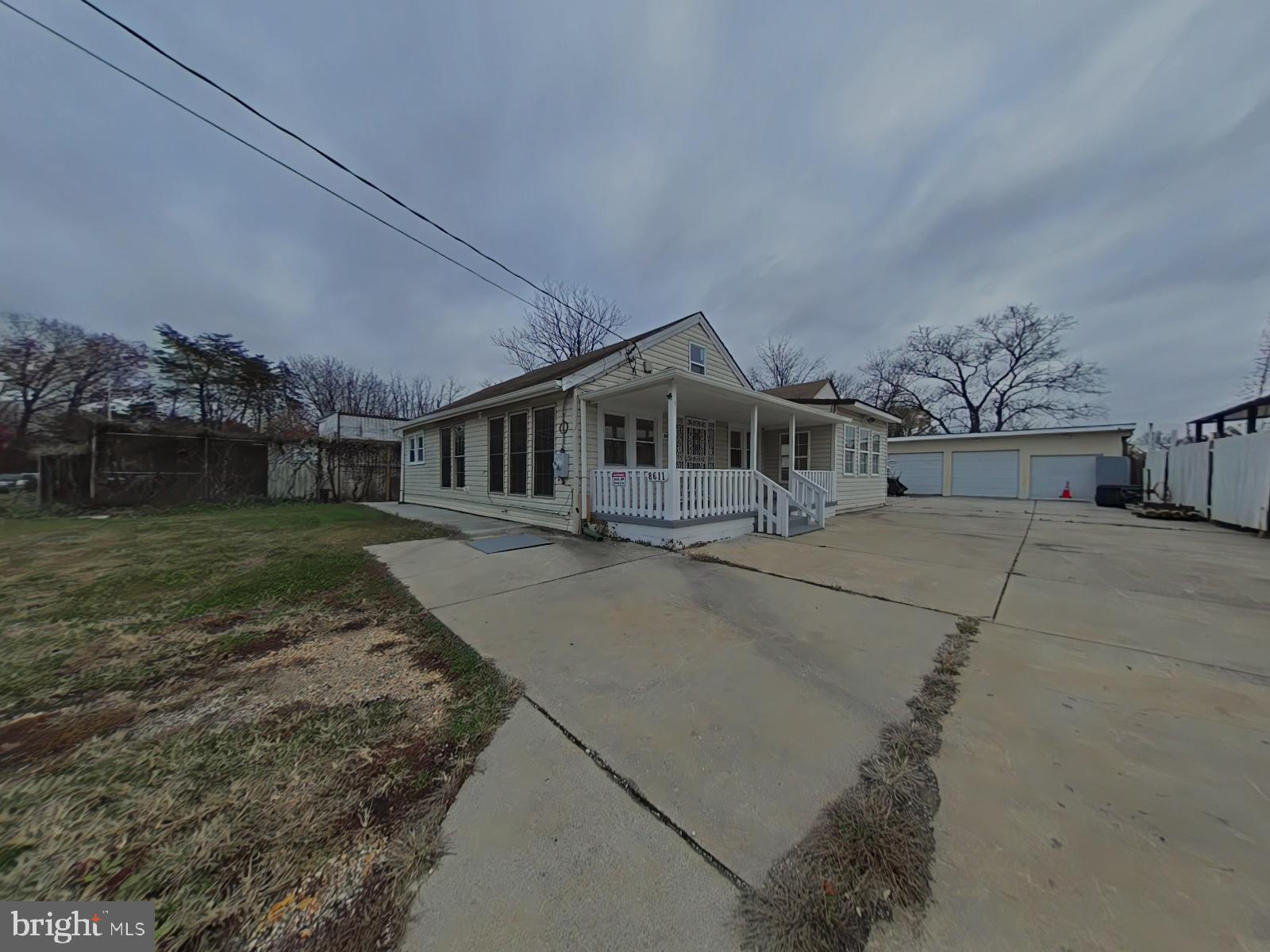 8611 Westphalia Road Upper Marlboro, MD 20772 - Photo 22 of 26 front view of a house with a yard