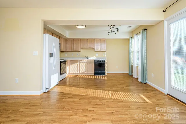 a view of a kitchen with a sink