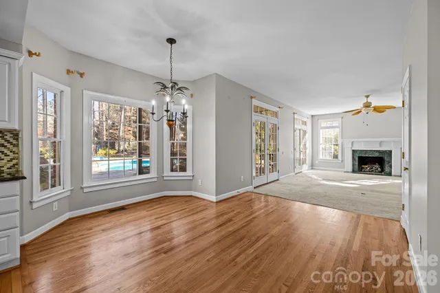 a view of balcony with wooden floor